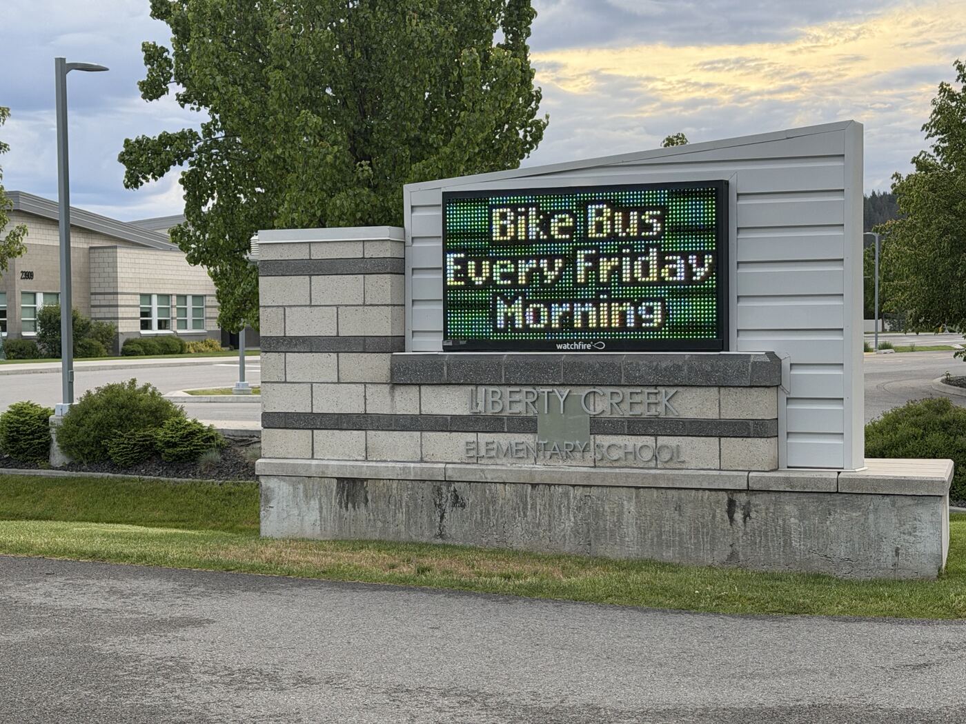 Liberty Creek Elementary School reader board announcing Bike Bus every Friday morning